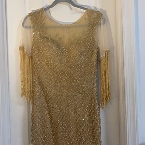 Lara designs gold beaded heavy gown